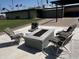 Community fire pit with seating for relaxing evenings at 2701 E Allred Ave # 68, Mesa, AZ 85204