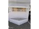 Clean exterior of the home with a well-maintained rock garden at 2701 E Allred Ave # 68, Mesa, AZ 85204