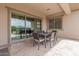 Outdoor patio with seating and glass doors leading inside at 10005 W Spur Dr, Peoria, AZ 85383