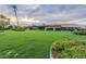 Community green space with clubhouse and landscaping at 7710 E Gainey Ranch Rd # 133, Scottsdale, AZ 85258