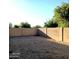 Small backyard with gravel and block wall at 9419 W Sheridan St, Phoenix, AZ 85037