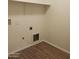 Laundry room with linoleum floor and shelving at 9419 W Sheridan St, Phoenix, AZ 85037