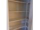 Empty pantry with adjustable shelving at 9419 W Sheridan St, Phoenix, AZ 85037