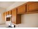 Well-maintained wood kitchen cabinets at 9419 W Sheridan St, Phoenix, AZ 85037