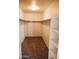 Large walk-in closet with shelving and carpet flooring at 9419 W Sheridan St, Phoenix, AZ 85037