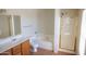 Bathroom with bathtub, shower, and double vanity at 9419 W Sheridan St, Phoenix, AZ 85037