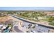 Aerial view of a house and neighborhood, showcasing the property's location and surrounding area at 1606 E Minton St, Mesa, AZ 85203