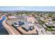 Aerial view of a house with a pool, showcasing the property and its surroundings at 1606 E Minton St, Mesa, AZ 85203