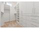 Spacious walk-in closet with ample shelving and hanging space at 1606 E Minton St, Mesa, AZ 85203