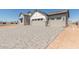 Large driveway leading to a two-car garage at 1606 E Minton St, Mesa, AZ 85203