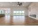 Spacious living room with fireplace and sliding glass doors at 1606 E Minton St, Mesa, AZ 85203