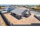 Aerial view of a house, highlighting the rear and the undeveloped backyard at 1606 E Minton St, Mesa, AZ 85203