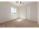 Spacious bedroom with neutral decor and a ceiling fan at 1606 E Minton St, Mesa, AZ 85203