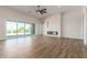 Open living space with a fireplace and lots of natural light at 1606 E Minton St, Mesa, AZ 85203