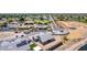 Aerial view of a house showing the backyard, solar panels, and neighborhood setting at 1606 E Minton St, Mesa, AZ 85203