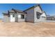 Two-story home with stone and wood siding at 1606 E Minton St, Mesa, AZ 85203