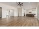 Open living room features a seamless transition to the kitchen, creating an airy feel at 1606 E Minton St, Mesa, AZ 85203
