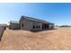 House exterior showcasing backyard and landscaping at 1606 E Minton St, Mesa, AZ 85203