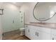Modern bathroom with a large mirror and a walk-in shower at 1606 E Minton St, Mesa, AZ 85203