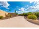 Long driveway leading to a private gated entrance at 6023 E Turquoise Ave, Paradise Valley, AZ 85253