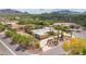 Aerial view of a house with a large yard and mountain views at 6023 E Turquoise Ave, Paradise Valley, AZ 85253