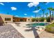 Inviting pool and spa surrounded by a large, paved patio at 6023 E Turquoise Ave, Paradise Valley, AZ 85253