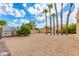 Large backyard with playhouse, shed, and mature citrus tree at 6023 E Turquoise Ave, Paradise Valley, AZ 85253