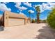 Two-car garage with ample space and additional parking at 6023 E Turquoise Ave, Paradise Valley, AZ 85253