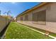 Artificial turf backyard with plenty of space at 14623 W Hearn Rd, Surprise, AZ 85379