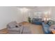 Cozy living room featuring comfortable seating and warm, inviting decor at 14623 W Hearn Rd, Surprise, AZ 85379