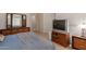 Spacious bedroom with ample room for furniture and a large TV at 14623 W Hearn Rd, Surprise, AZ 85379