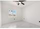 Bright and airy bedroom with large window and tile flooring at 33 N 375Th Ave, Tonopah, AZ 85354