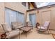 Private patio with seating and umbrella at 17833 N 45Th Ave, Glendale, AZ 85308