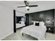 Bedroom with twin beds and black accent wall at 8247 E Devonshire Ave, Scottsdale, AZ 85251