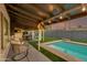 Outdoor patio area with seating and pool view at 8247 E Devonshire Ave, Scottsdale, AZ 85251