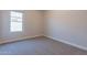 Well-lit bedroom featuring carpet, and a window at 9859 W Potter Dr, Peoria, AZ 85382