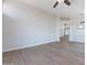 Open concept living space with wood-look floors at 9859 W Potter Dr, Peoria, AZ 85382