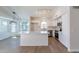 Modern kitchen with white cabinets and large island at 9859 W Potter Dr, Peoria, AZ 85382