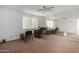 Spacious home office with mirrored wall and desk at 7126 N 19Th Ave # 173, Phoenix, AZ 85021