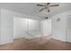 Upstairs area with carpet, ceiling fan and staircase at 7126 N 19Th Ave # 173, Phoenix, AZ 85021