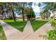 Concrete pathways throughout the community with lush green grass at 7126 N 19Th Ave # 173, Phoenix, AZ 85021
