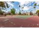 Community tennis court and basketball court with surrounding landscaping at 7126 N 19Th Ave # 173, Phoenix, AZ 85021