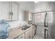Kitchen features double sink, ample cabinets and appliances at 7126 N 19Th Ave # 173, Phoenix, AZ 85021