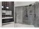 Bathroom with a large walk-in shower, marble tile, and modern fixtures at 28341 N 112Th Way, Scottsdale, AZ 85262