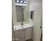 Bathroom with vanity, mirror, and modern light fixture at 7300 N 51St Ave # 160, Glendale, AZ 85301