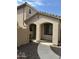 Tan two-story house with covered entryway at 2514 N 73Rd Dr, Phoenix, AZ 85035