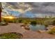 Relaxing pool and patio area with desert landscape and sunset views at 42311 N Sierra Vista Rd, Cave Creek, AZ 85331