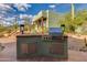 Built-in outdoor kitchen with stainless steel appliances at 42311 N Sierra Vista Rd, Cave Creek, AZ 85331