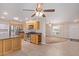 Bright kitchen with stainless steel appliances and ample cabinet space at 10318 W Desert Forest Cir, Sun City, AZ 85351