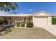Ranch style home with a one car garage and small front yard at 10318 W Desert Forest Cir, Sun City, AZ 85351